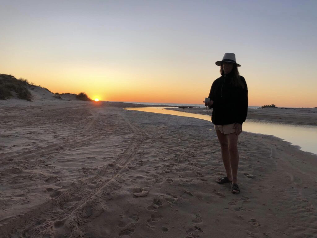 Sunset by a sandy beach